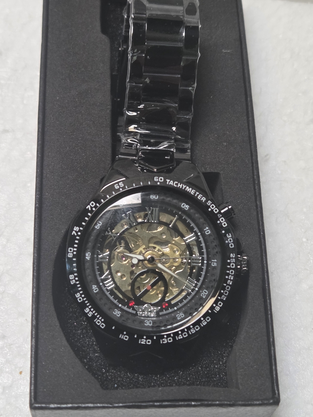 WINNER Black Skeleton Mechanical Watch with Tachymeter Bezel